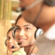 woman with headphones smiling