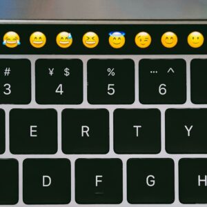 Emojis and emoticons on a keyboard